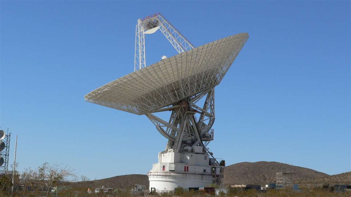 A giant antenna dish at the Goldstone Deep Space Network