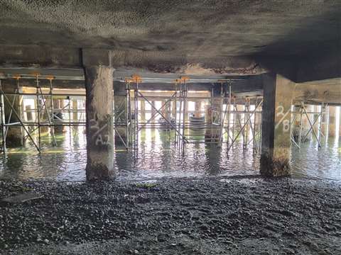 A view from underneath the Admiralty Apartments structure.