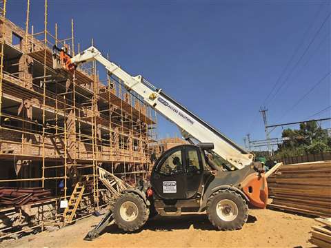 A telehandler takes on construction work. 